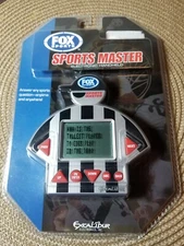 FOX Sports Master Excalibur Handheld Electronic Sports Game. (R1)