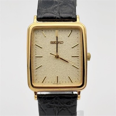 SEIKO 7N01-0FB0 Quartz Analog Gold Tone Black Strap in Hand Square