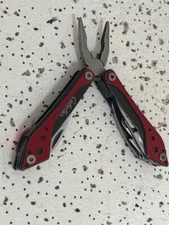 Cabela’s Small Multi-Tool Red 3” Close —