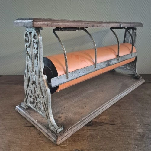 Antique paper roll holder/dispenser, original gift wrapping paper, cast...