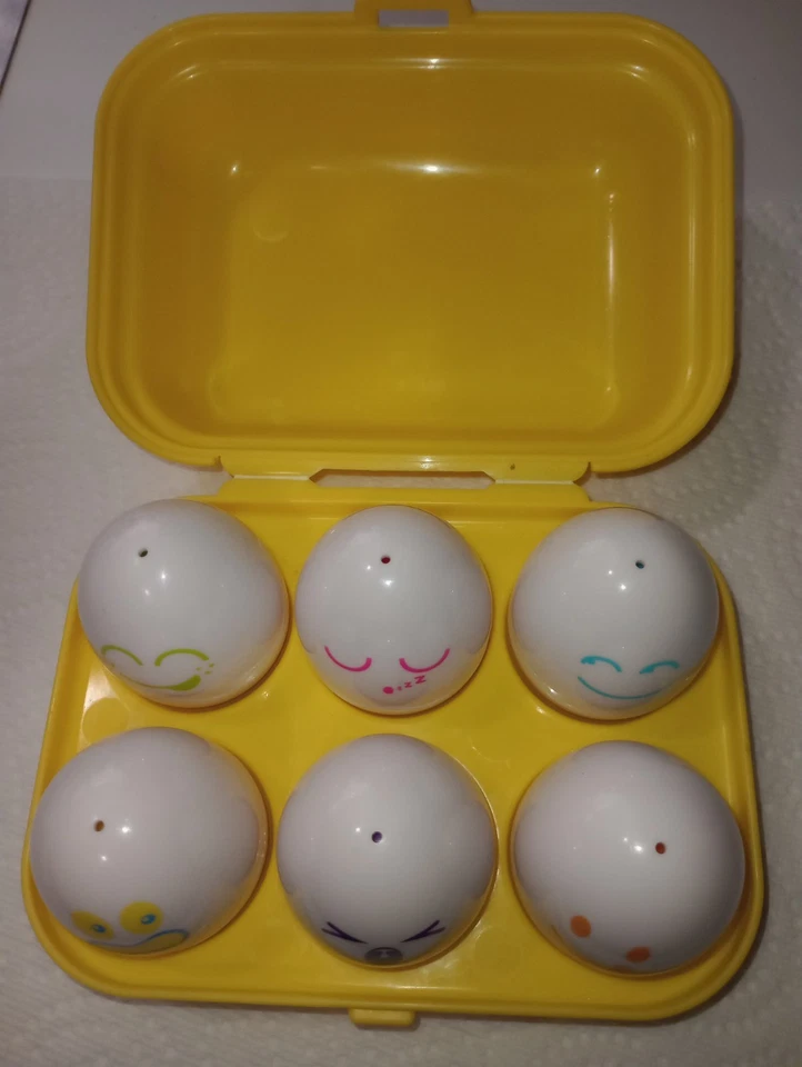 Clasificador de forma de cartón de huevos Tomy Hide N Squeak 1993 de colección juguete a juego Foto 3 de 4