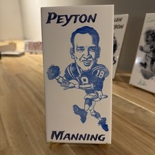 Laser engraved Peyton Manning 🏈Ceramic Tile With Plexiglass Stand! Cartoon 