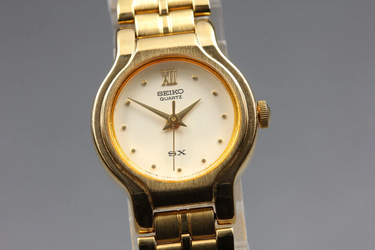 Reloj para mujer SEIKO SX dorado redondo de colección Qz V401-0091 vintage 19...