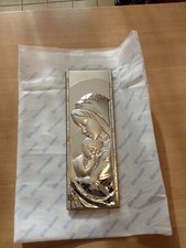 Quadro in argento con soggetti religiosi e la parte dietro in legno. Nuovo