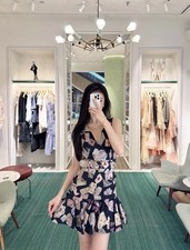 Zimmermann’s dressNew Resort Floral Print V-Neck Sleeveless Ruffle Midi Dress