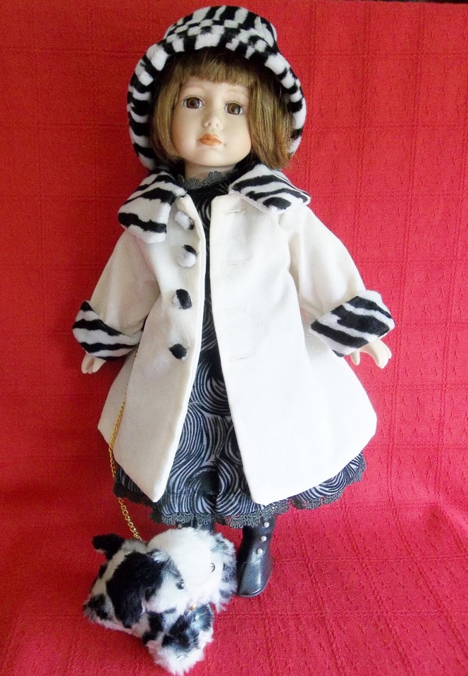 Porcelain Doll 'Dog Walker Dressed in Cream Coat and Black & Cream Hat
