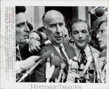 Press Photo John N. Mitchell talks to newsmen outside District Court, Washington