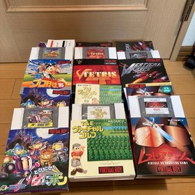 Excellent condition Virtual Boy console + 6 games + AC adapter set.Tested