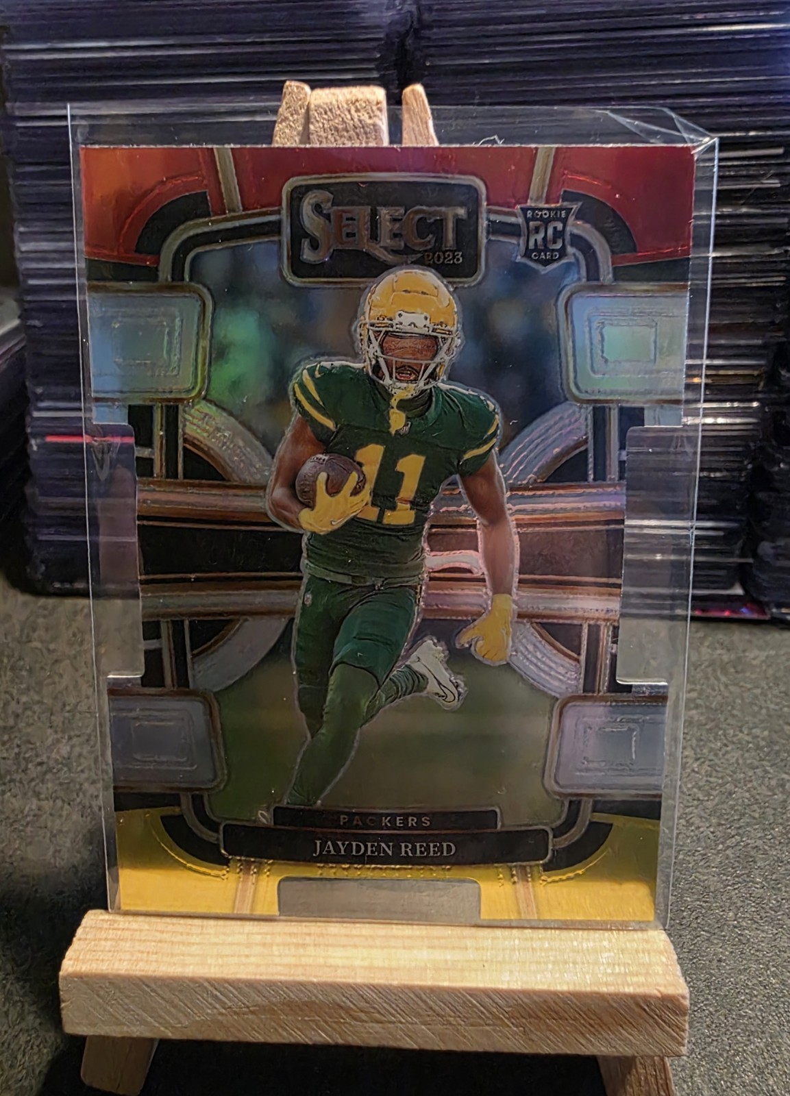 2023 Panini Select - Concourse Jayden Reed #38 Red & Yellow Prizm Die-Cut (RC)