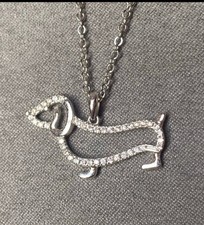 Silver colored Dachshund Weenie Dog Necklace with clear rhinestones