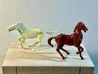 Lot of 2 Marx 1950's original 54mm plastic horses as shown.