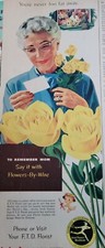 1956 FTD Florist telegraph delivery woman gray hair yellow roses Vintage ad