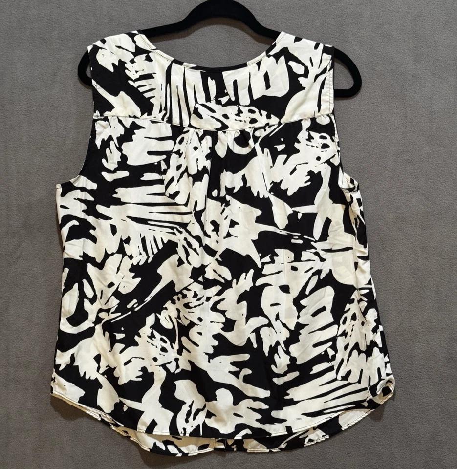 Blusa sin mangas negra blanca con estampado geométrico sin mangas boho negocios carrera casa de campo Foto 2 de 4