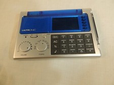 Ultronic WS-9 World Traveler Portable Flip Up Alarm Clock Radio Calculator