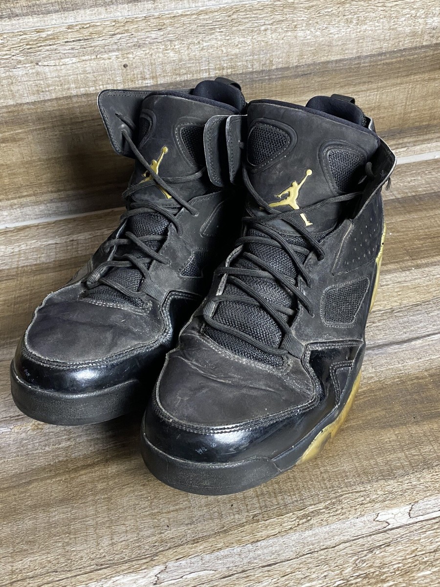 black and gold jordan flight