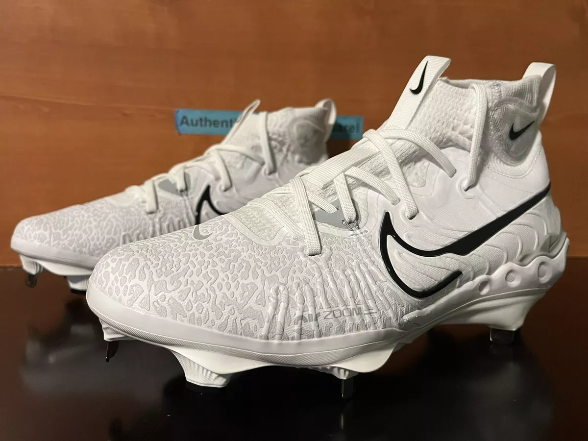 White nike top metal baseball cleats