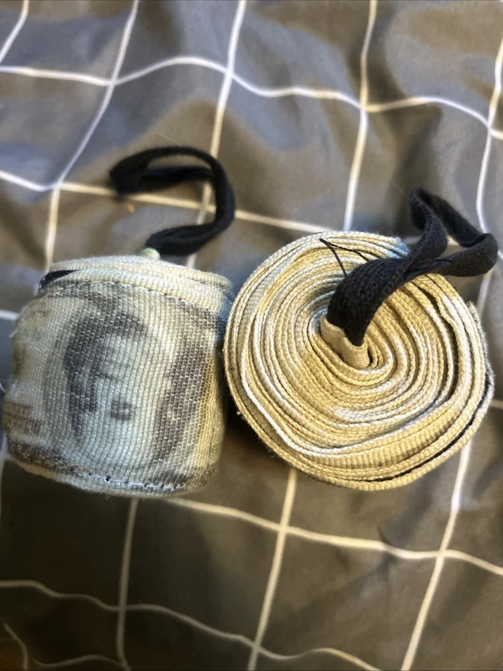 Envolturas de mano para billetes de cien dólares de boxeo de título Foto 3 de 4