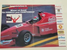 F1 Justin Wilson hand signed mini poster, 30x20cm