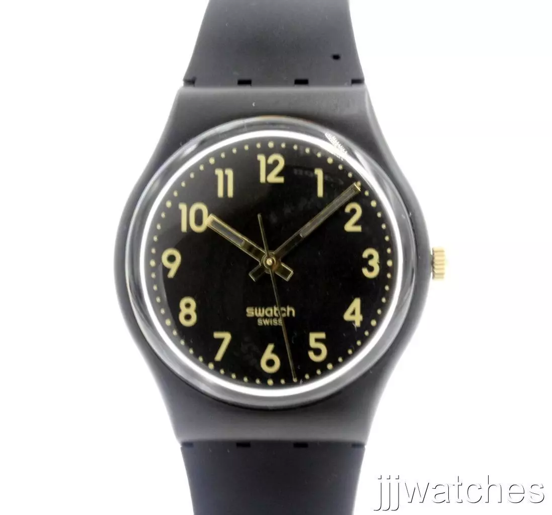 Black and top gold swatch watch