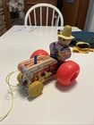 Vintage Fisher Price Farmer Tractor Wood Pull Toy #629 1961 Wobbles & Head Spins