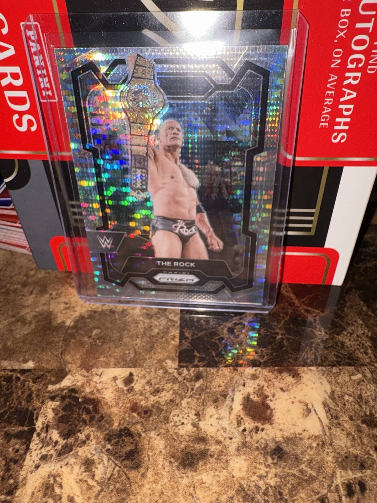 2024 Prizm WWE The Rock #193 WWE Legend Silver Pulsar Prizm /499
