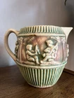 Roseville Donatello Pitcher 7” Pottery Cherub  Early Blue Mark 1915-1925