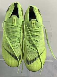 bright green football boots