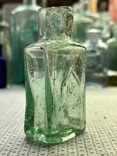 1905 &ldquo;M&rdquo; for Morrell&rsquo;s Embossed Aqua Glass Ink Bottle (H675)