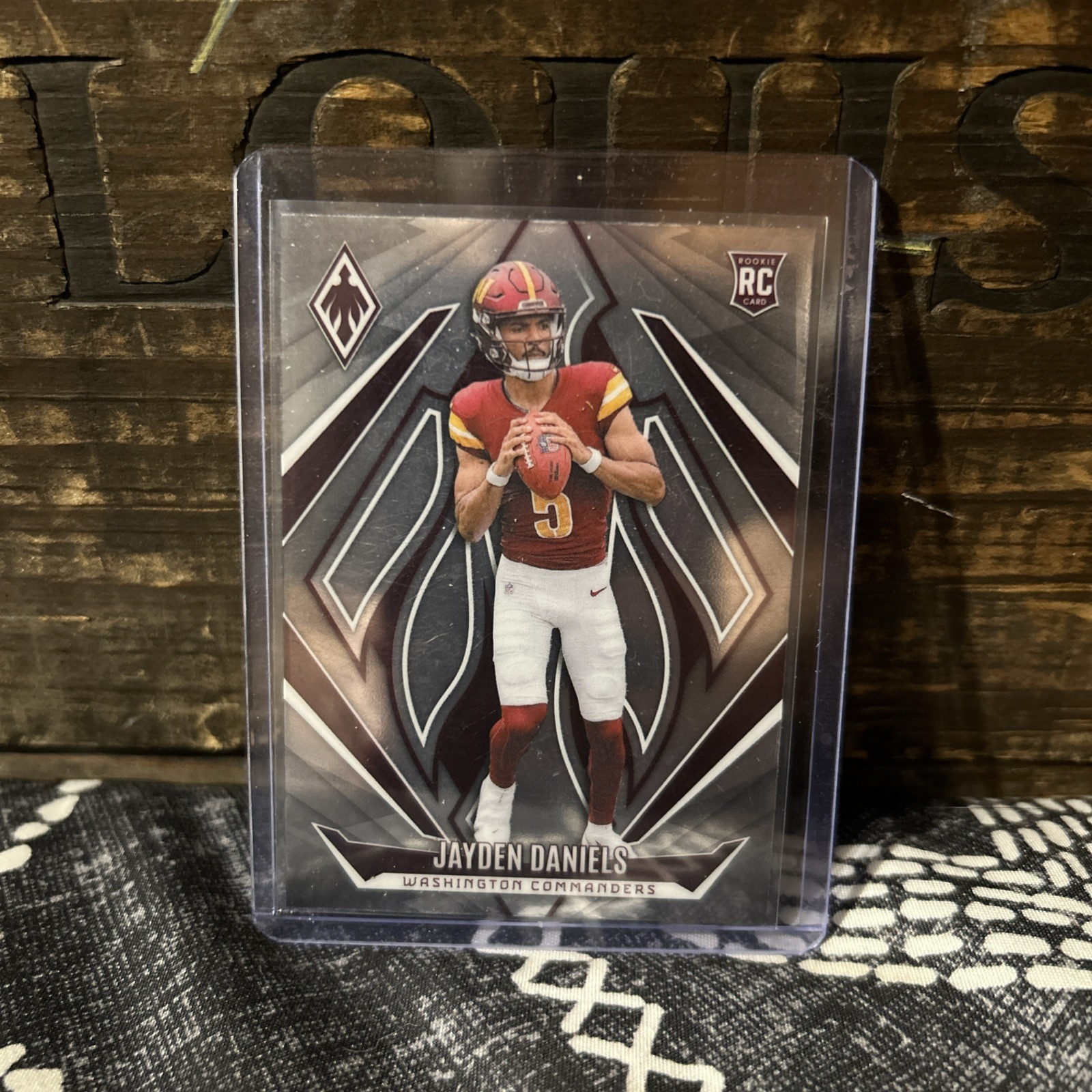 2024 Panini Phoenix - Rookies Jayden Daniels #198 Hyper (RC)