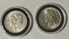 US Silver Dollars - 1879 Morgan And 1924 Peace