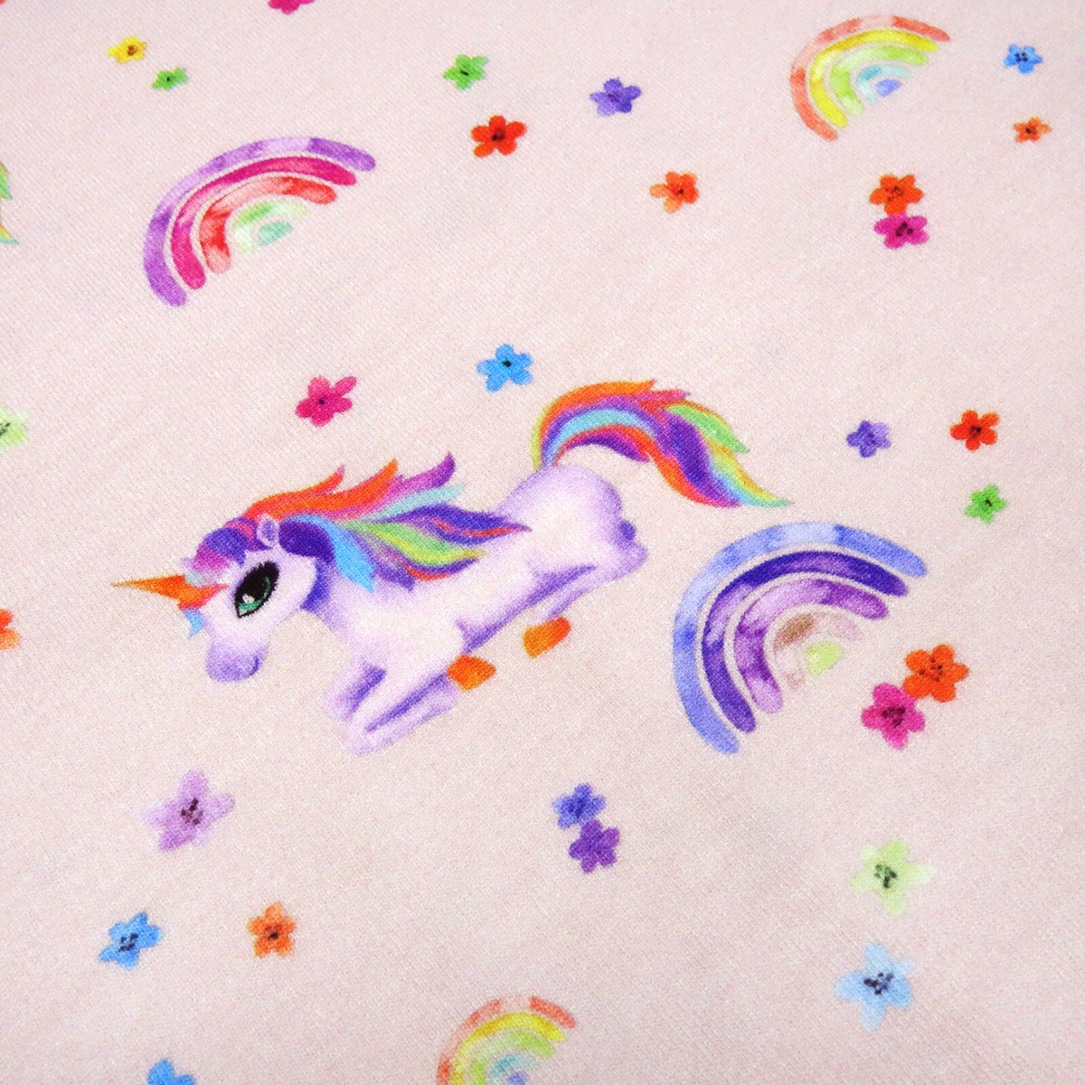 Stoff Baumwolle Jersey Einhorn Regenbogen Blüten zart rosa bunt