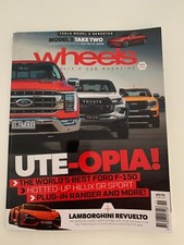 WHEELS NOV 2023 MAGAZINE-FORD F150-TESLA 3-LAMBORGHINI REVUELTO-FERRARI ROMA-4X4