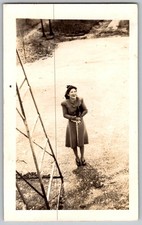 Vtg B&W Snapshot Woman In Coat Holding Rope Outdoors 1940s