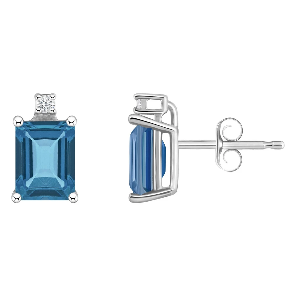 Aretes de oro blanco de 14K con detalles de diamantes y topacio azul Londres corte esmeralda de 6x4 mm Foto 2 de 4