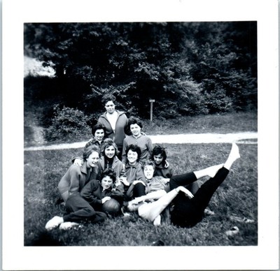 1950s Group of Young Women Relaxing on Grass After Sports Game Vintage Photo