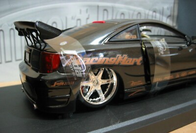 Toyota Celica 1:18, gelb-schwarz, Import Racer by Jada Toys (Gebraucht) in Zofingen für CHF 47