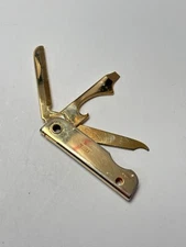 VTG Trim Trio Knife Nail File Bottle Opener Multi Tool Bassett USA Gold Tone