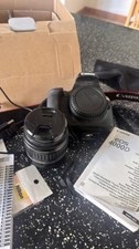 Canon EOS 4000D Zoom Kit: camera, 2 zoom lenses, strap, battery and charger