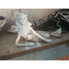 laying mermaid silver tail