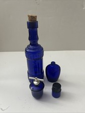collection of cobalt blue glass bottles