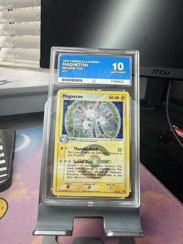 Magneton 27/112 ACE graded card