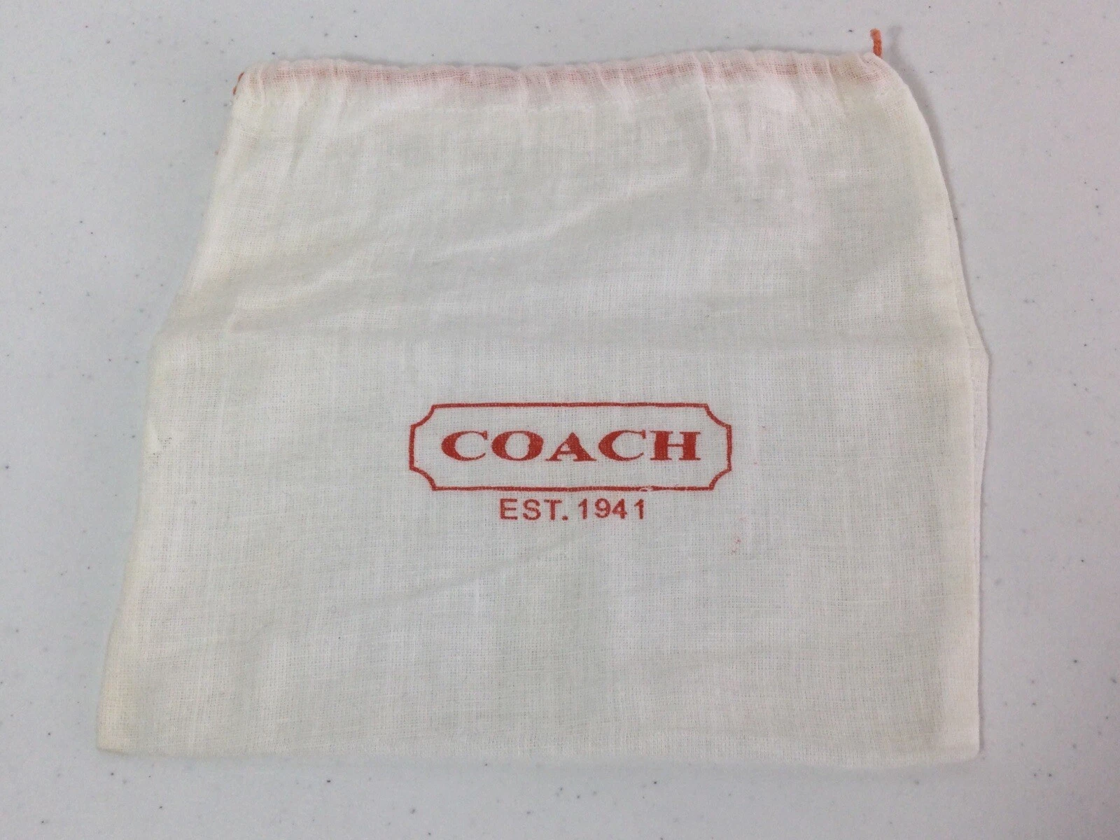 COACH Sacchetto con coulisse per gioielli avorio bianco. 8” x 7 5”. NUOVO.