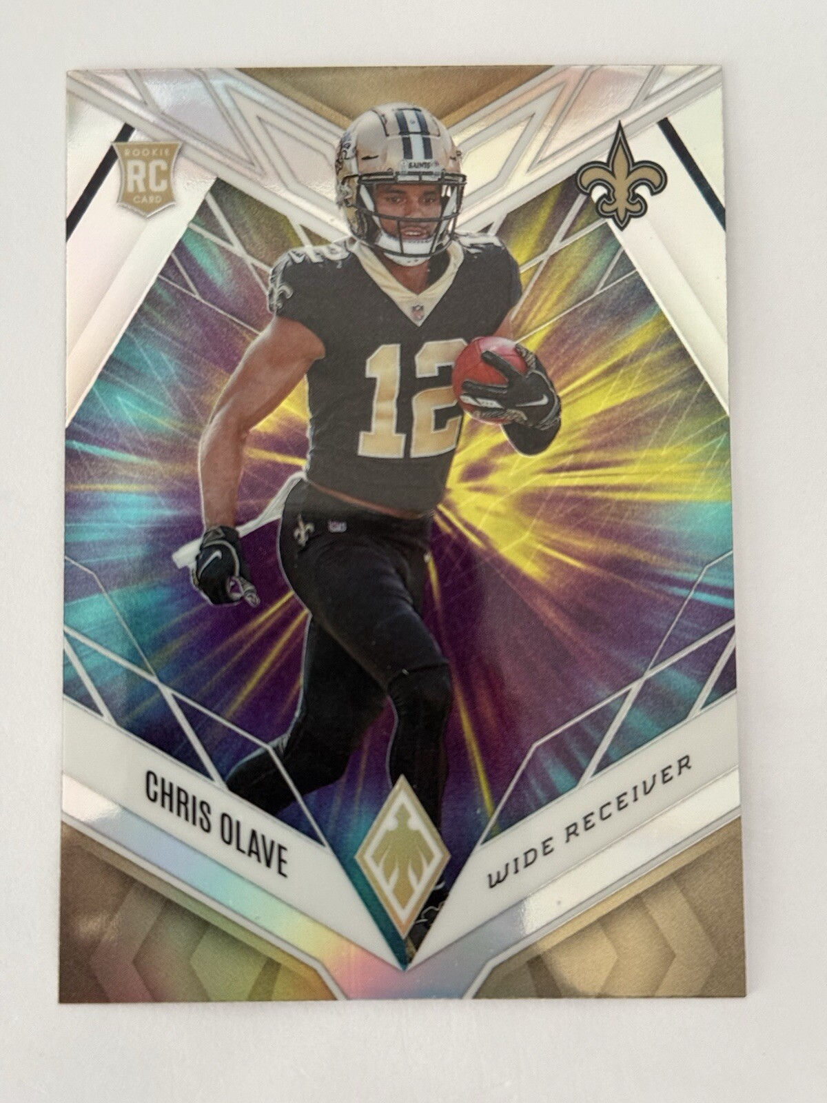 2022 Panini Phoenix Chris Olave RC Color Burst #109 New Orleans Saints