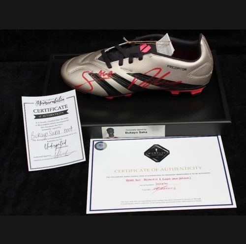 Signed Saka Arsenal football boot in display case, certificate of authenticity