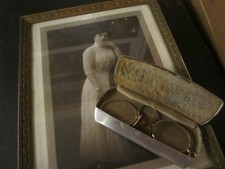 Antique wire frame eyeglasses with ornate case