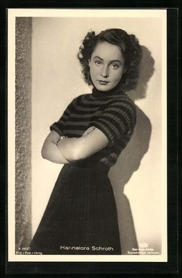 Actress Hannelore Schroth in a skirt with folded arms