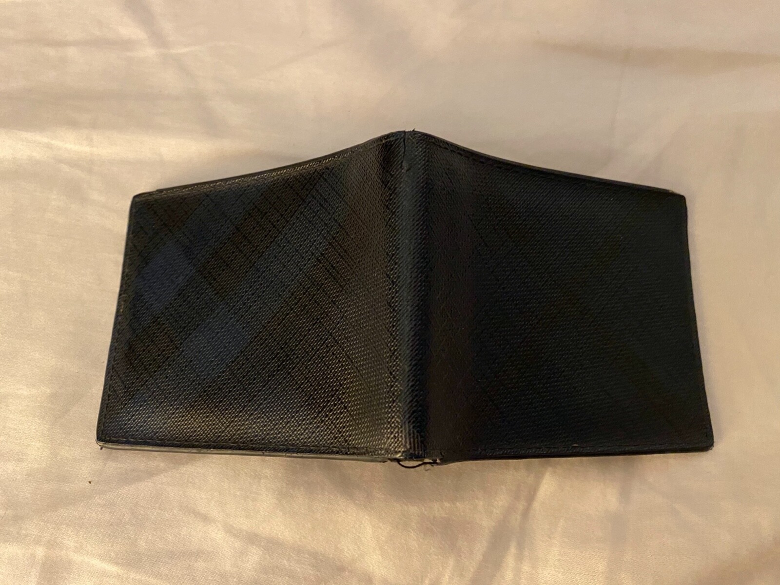 1983 check and leather international bifold wallet
