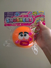 VIRAL SQUISHY ORB Curiosities SMUSHER Squish Stretch Squeeze Toy Orange Face