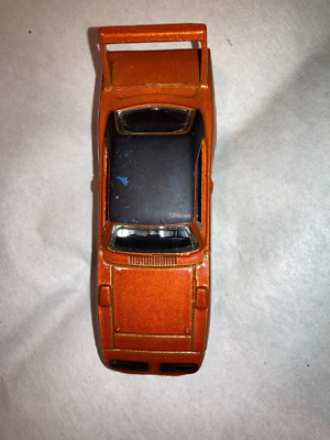 Hot Wheels 2005 Plymouth Sunbird, Dark Orange with Black Roof (B)