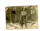 Man military uniform gun North Highlander sign in background vintage photo ww1
